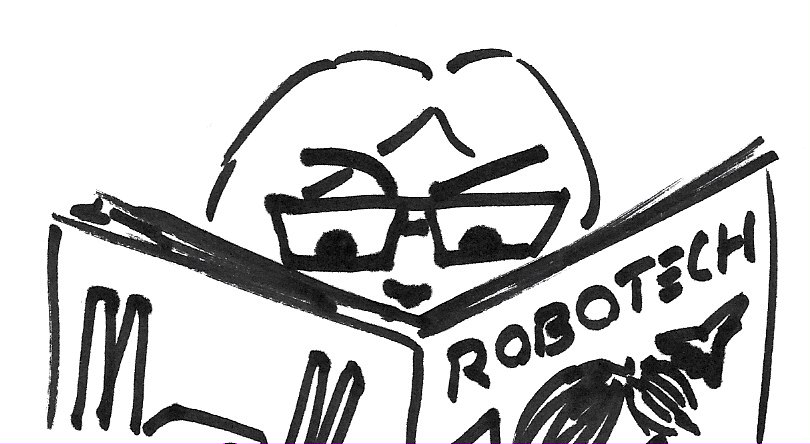 Captain JLS peeking over an oversized Robotech comic.