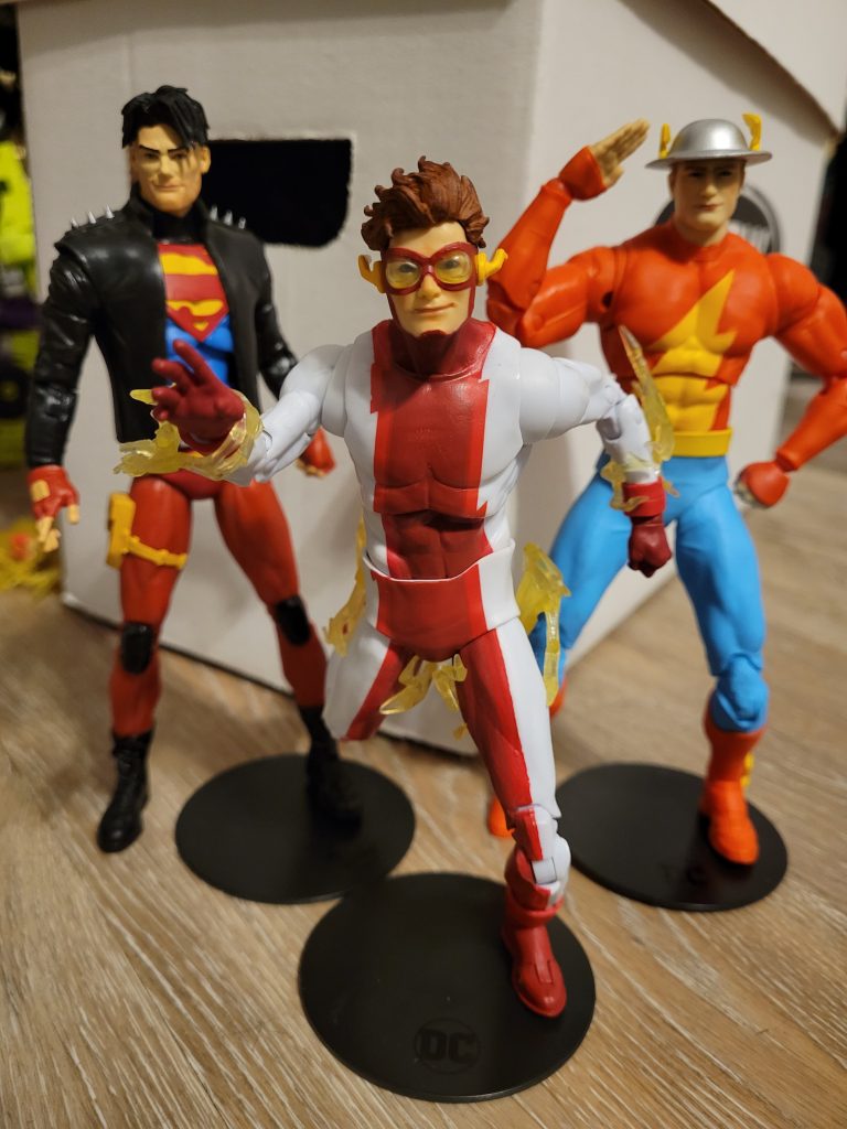 McFarlane Toys's DC Multiverse Gold Label Bart "Impulse" Allen, racing ahead in front of Todd's recently released figures of fellow Young Justice member Superboy and fellow speedster Jay Garrick, the original Flash.