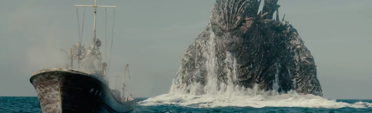 Godzilla emerges from the water to menace a ship, from GODZILLA MINUS ONE.